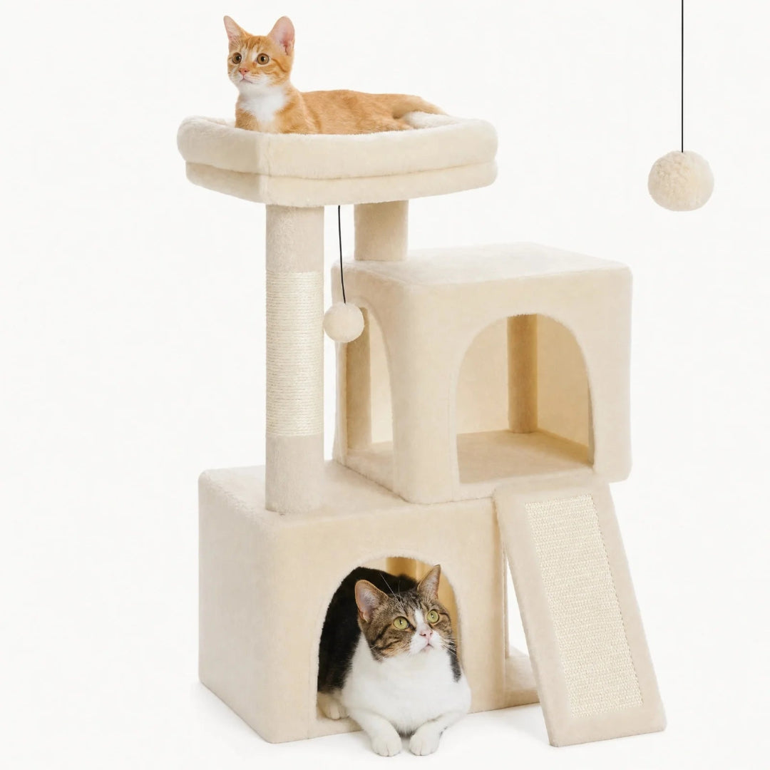 Two cats interacting with a beige multi-level cat condo featuring a cozy top perch, scratching ramp, and hideaway house.