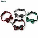 Assorted collection of red, black, white, and green plaid Christmas cat collars.