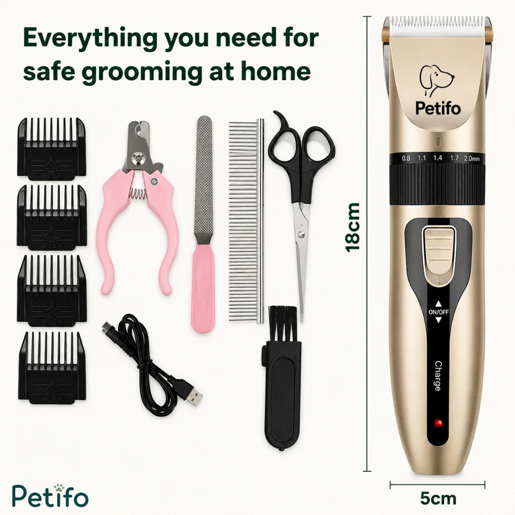 Complete home dog grooming kit with a gold clipper, four guide combs, scissors, and nail care tools.