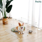 Corgi puppy resting inside a portable Petifo white wire dog playpen with a feeding bowl.