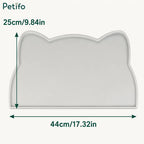 Dimension diagram of the cat-ear-shaped gray silicone pet mat showing measurements of 44 cm / 17.32 in wide and 25 cm / 9.84 in tall.