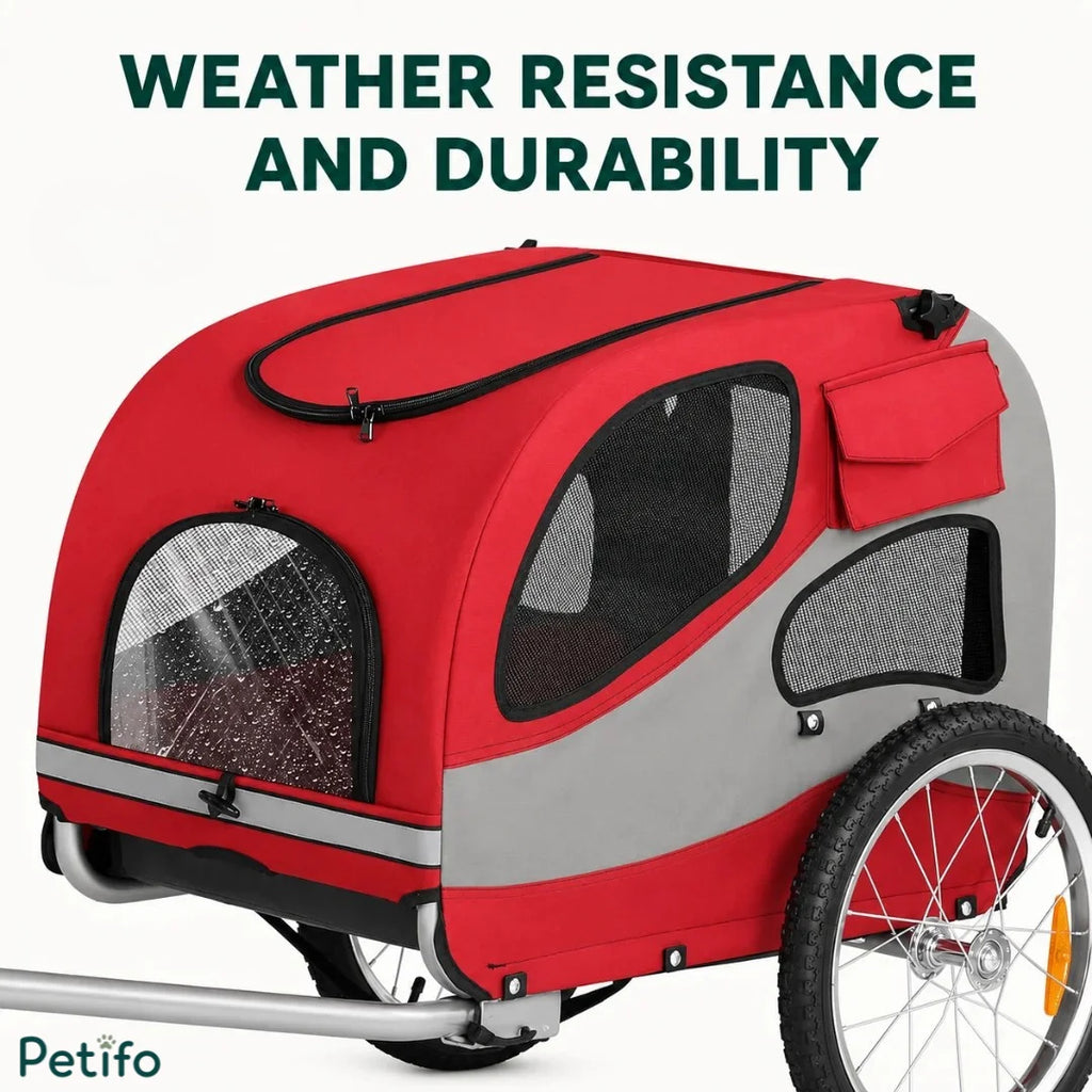 The Petifo pet bike trailer showing rain droplets on the clear front window, highlighting its weather-resistant and durable construction.