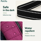 Close-up view showing the high-visibility reflective straps and water-repellent fabric of the dog winter coat.