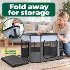 Folding the PawHut playpen for storage in the included bag